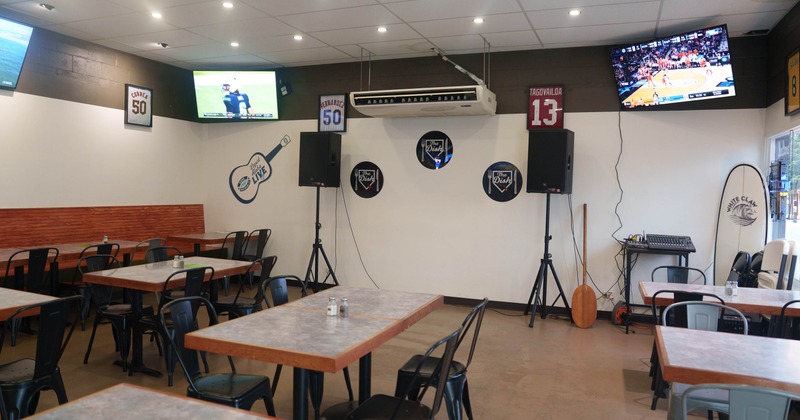 Interior, tables and chairs in dining area