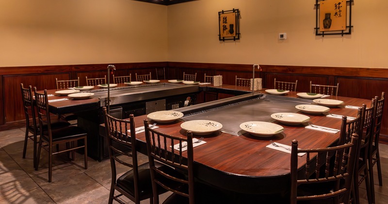 Private Japanese-style dining room with two large teppanyaki grills built into the tables