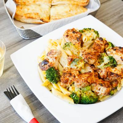 Grilled chicken broccoli salad and cheesy garlic bread.