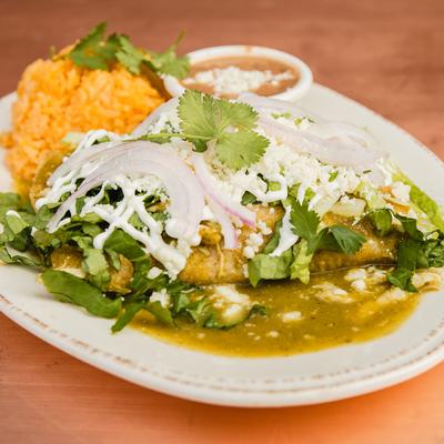 Green Enchiladas with Mexican crema & red rice on the side