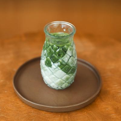 Iced Matcha Latte served on a tray.