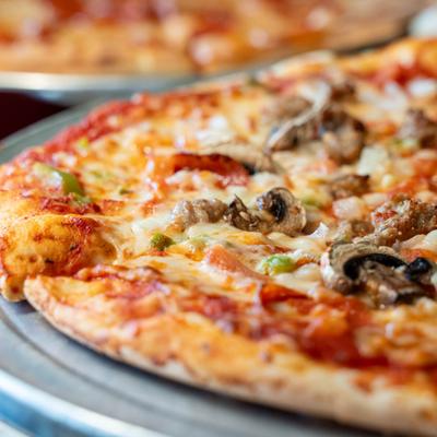 Close up of Philly Cheese Steak Pizza.