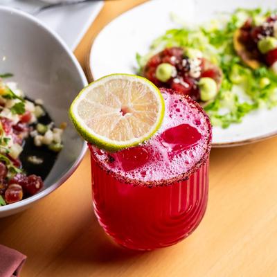 Oaxacan blood cocktail garnished with a lime wheel.