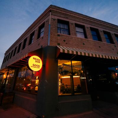The restaurant's building on the street corner.