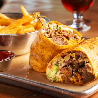 Shiitake mushroom wrap served with fries and ketchup.