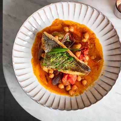 Wild Caught Local Fish with Spicy tomato white wine broth and roasted vegetables