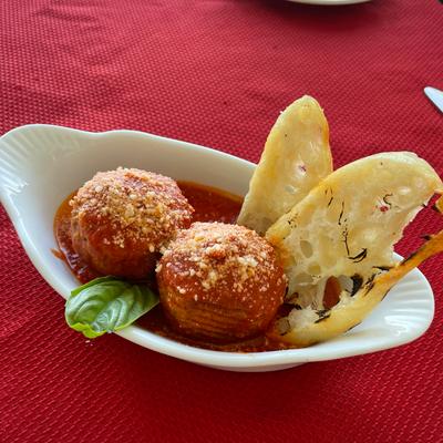 Wagyu meatballs, with marinara sauce, garlic, and oil bruschetta