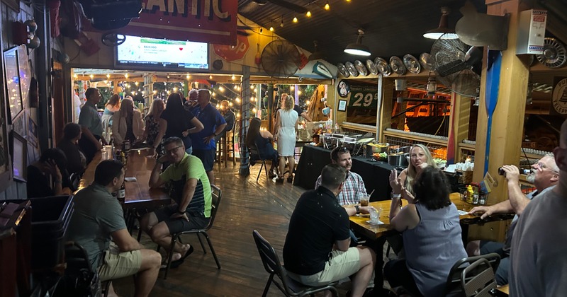 Interior, guests at a buffet dinner party