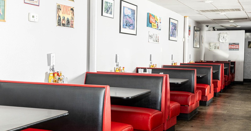 Interior, booths with tables waiting for the guests