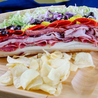 Godfather Italian cold sub with potato chips on the side.