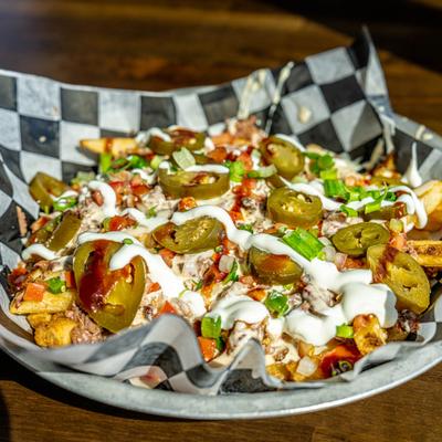 A serving of brisket nacho fries.