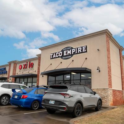 Restaurant outside,building and parking lot.