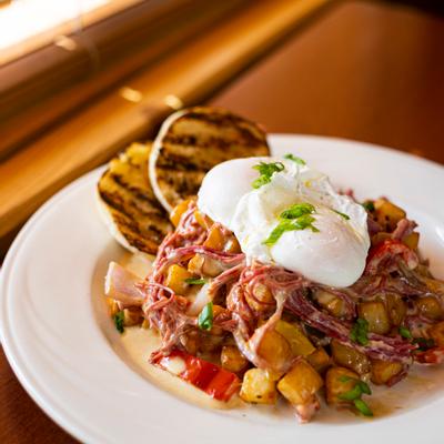 Mixed vegetables with baked potato, cream on top