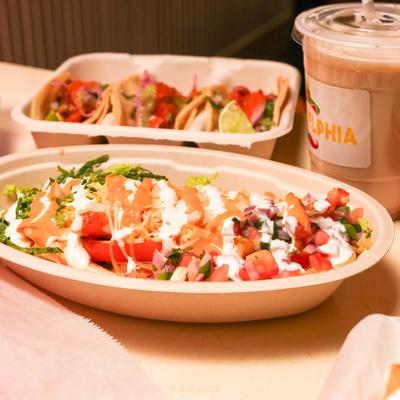 Salad, tacos, and a drink.