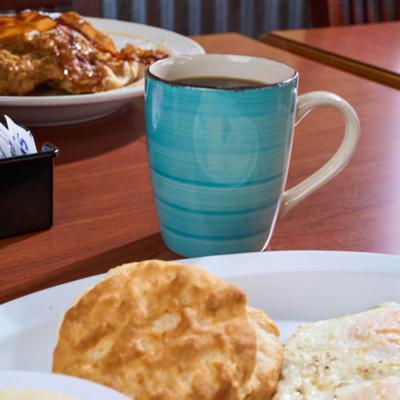Biscuit and a cup of coffee.