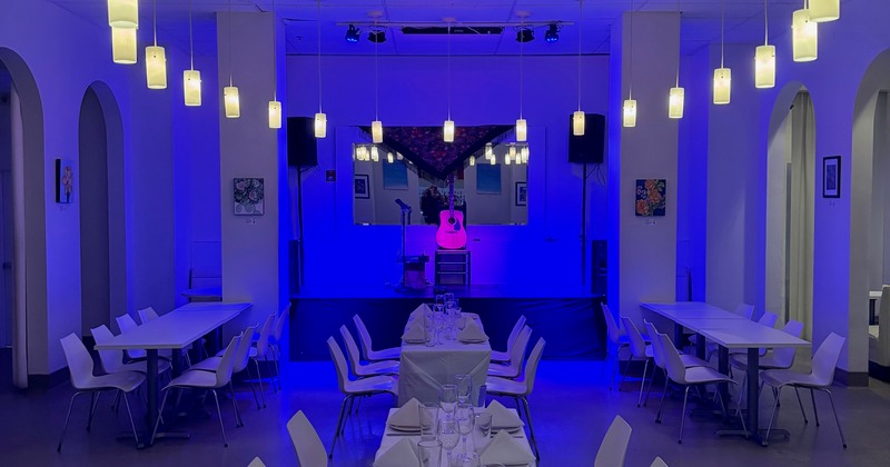 A room set up for an event with live music