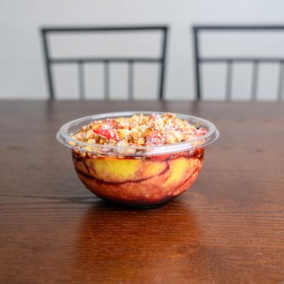 Arysi Bowl served in a clear, portable plastic container.