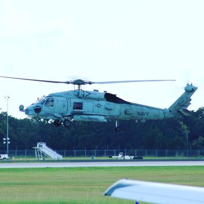 A seahawk helicopter takes off the field.