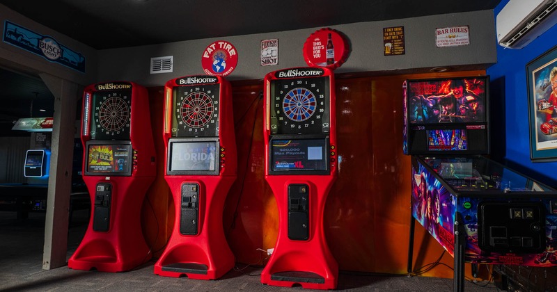 Interior, gaming room with dart boards