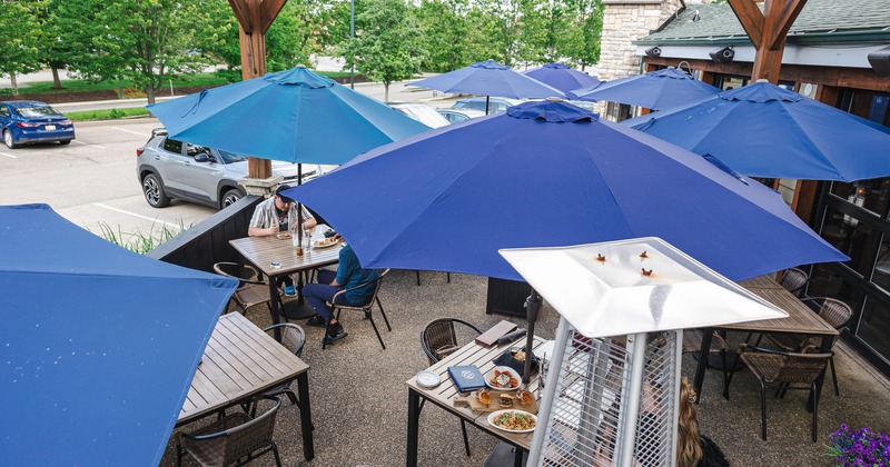 Patio, parasols, guests, view from above