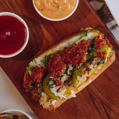 Chili hot dog with dips.