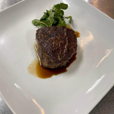 Grilled steak with microgreens