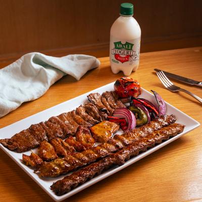 A combination plate and a drink.