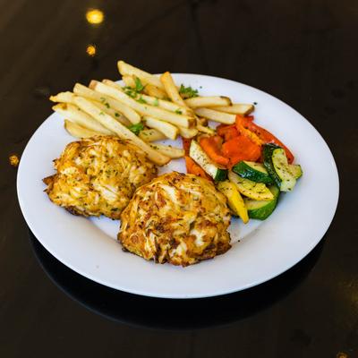 Crab cakes , grilled veggies and fries