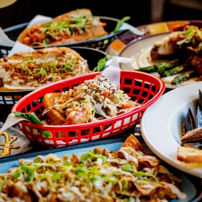 Assortment of dishes spread on a table.