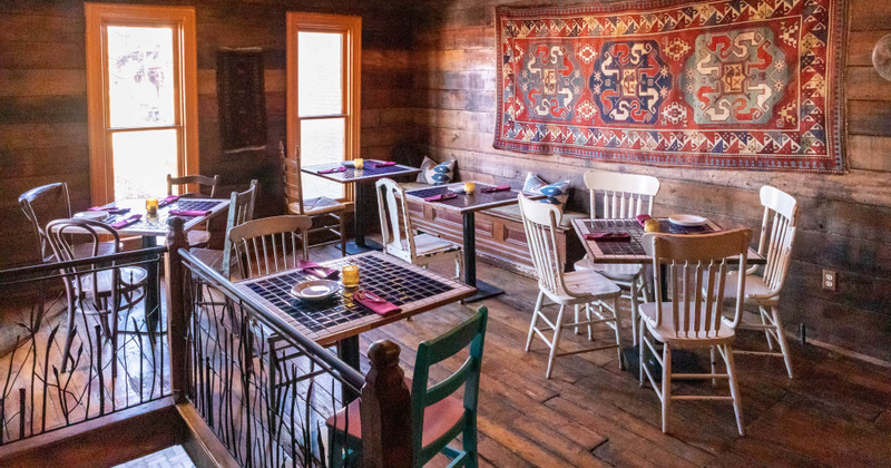 Interior, tables set and ready for guests