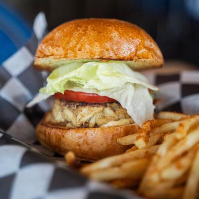 Crab Cake sandwich with a side of fries.