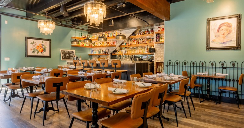 Interior, tables and chairs in dining area