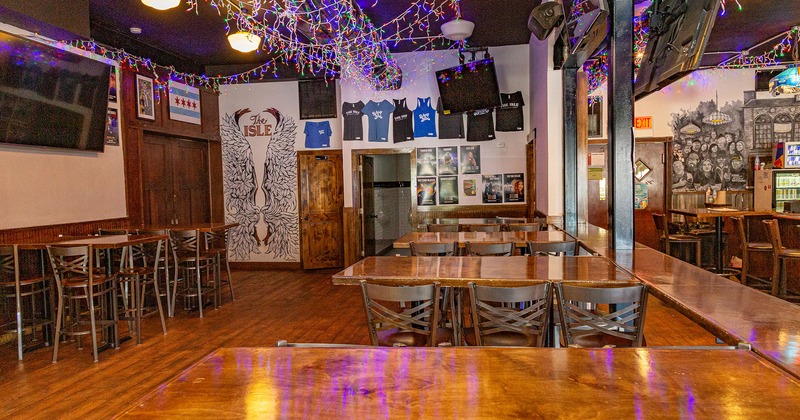 Interior, seating area with TVs and wall decorations