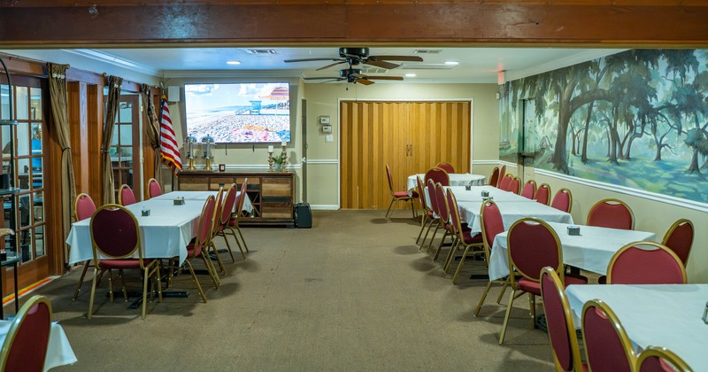 Interior, dining area with large painting