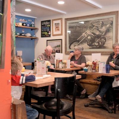 Guests dining at their tables.