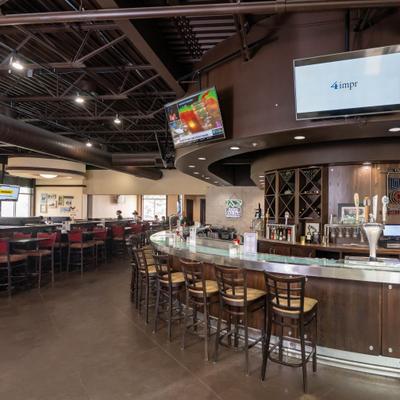 Circular bar counter and stools.