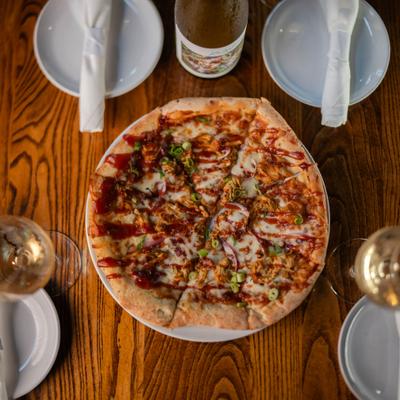 Served pizza on the table.