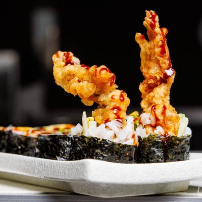 Spider roll featuring deep-fried soft-shell crab.