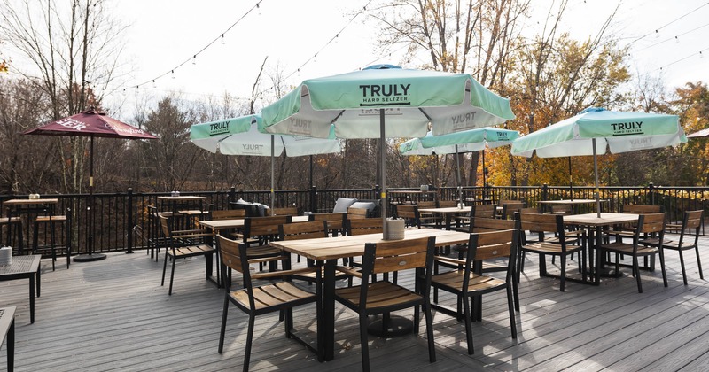 Exterior, tables with parasols and chairs