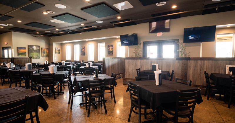 Interior, dining tables with chairs, TV screens