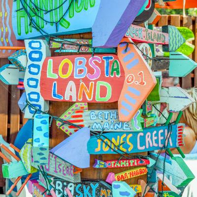 Exterior decor,  directional arrow signs to various places.