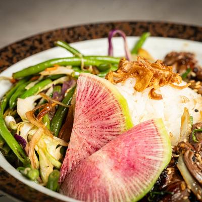 Marinated beef bulgogi steak, onion, rice, and veggies.