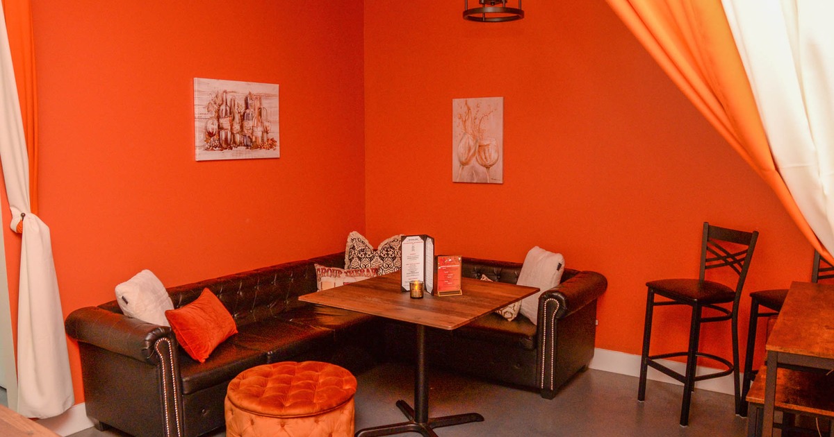 Sofa with table, pictures on the wall