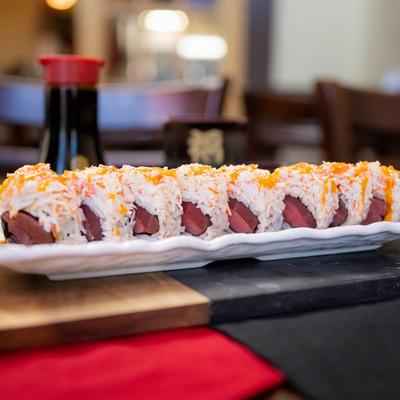 Spicy Girl roll served on a dining table.