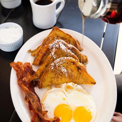 Bread, fried eggs and bacon