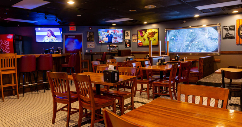 Interior, guest tables and chairs,  wall tv