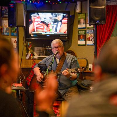 Guitar player performing.