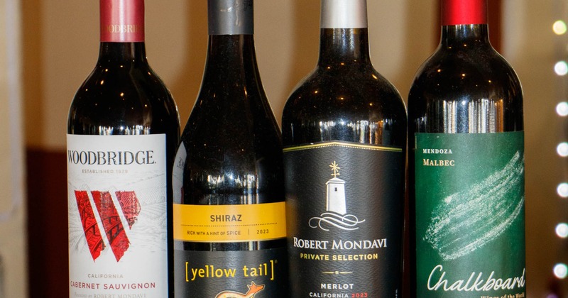 Several bottles of red wine served on the counter