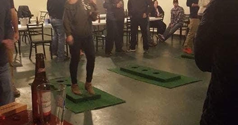 Interior, a large guest table with a message board behind