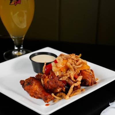 Buffalo chicken wings, with relish.